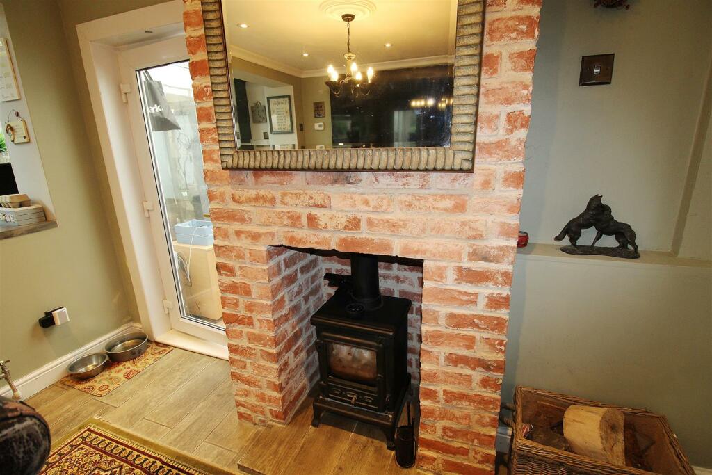 Log Burner in Dining Room