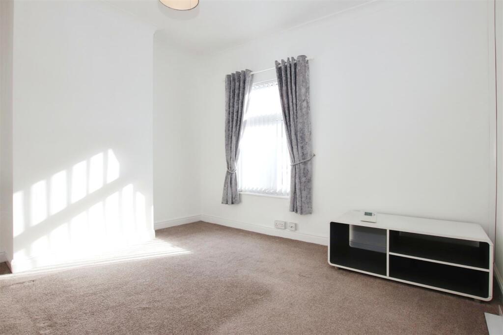 BEDROOM ONE (FRONT)
