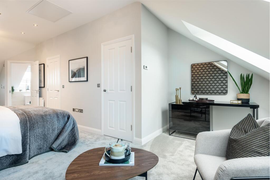 Norbury top floor main bedroom with dressing area and en suite shower room