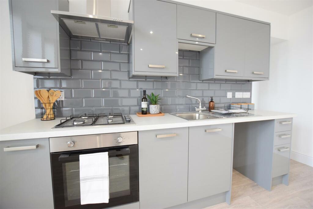 Apt 9 Living Kitchen (1).JPG