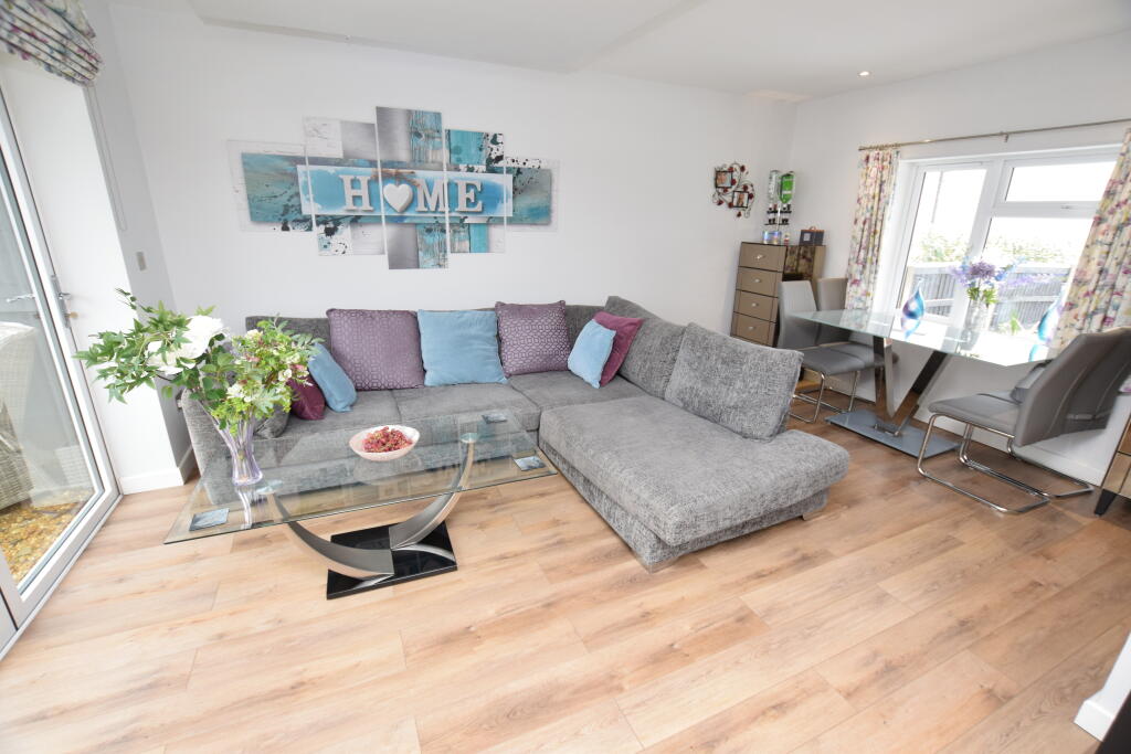 open plan lounge &amp; dining room