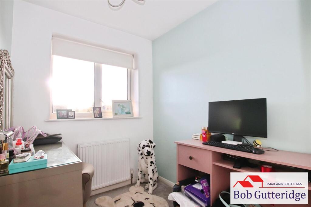 BEDROOM THREE (REAR)