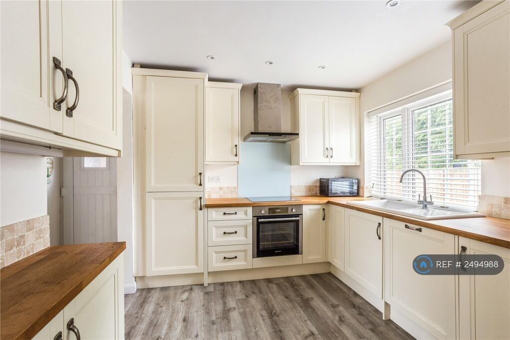 Kitchen With Wooden Surfaces And Int. Appliances 
