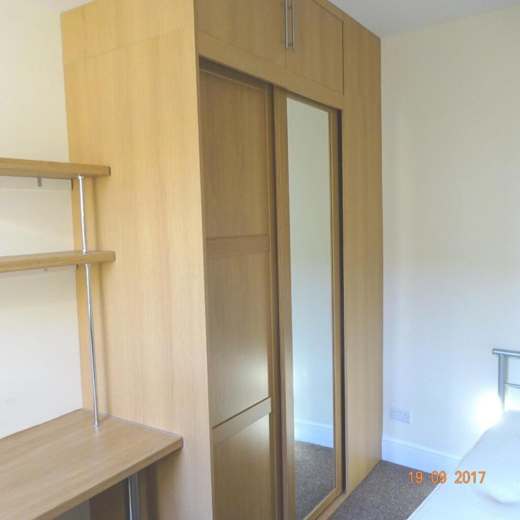Bedroom 1 fitted wardrobe.JPG