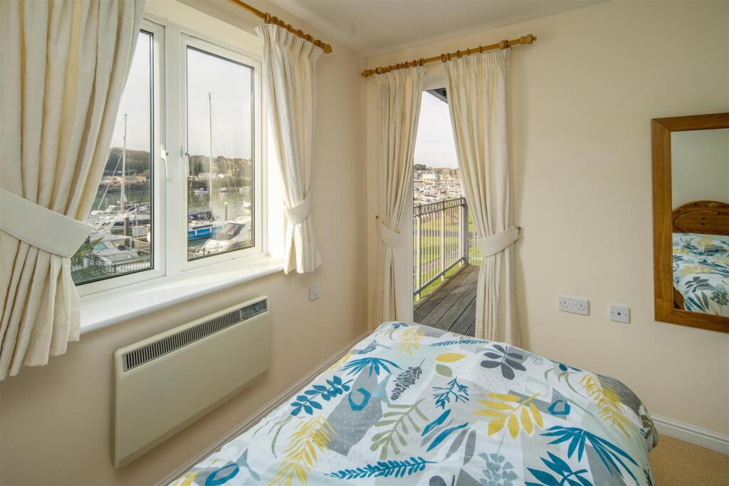 Bedroom 1 with Balcony Access.jpeg