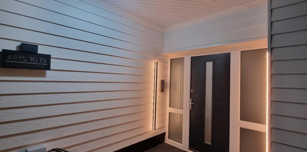 Nighttime Corinthian Court entrance.jpg