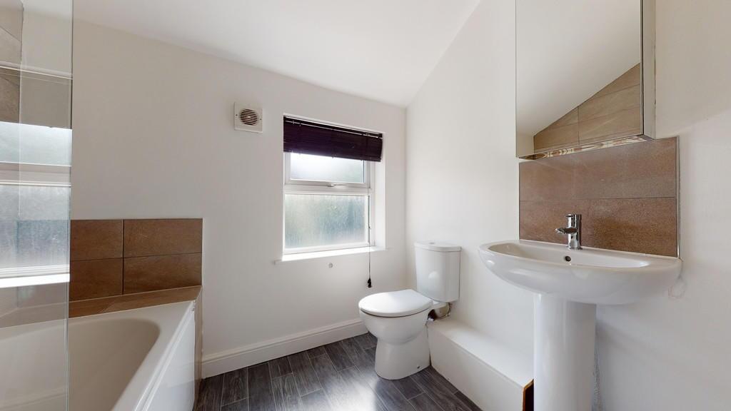 Bright and clean bathroom featuring a full bath...