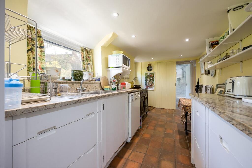 Long kitchen, utility out of shot