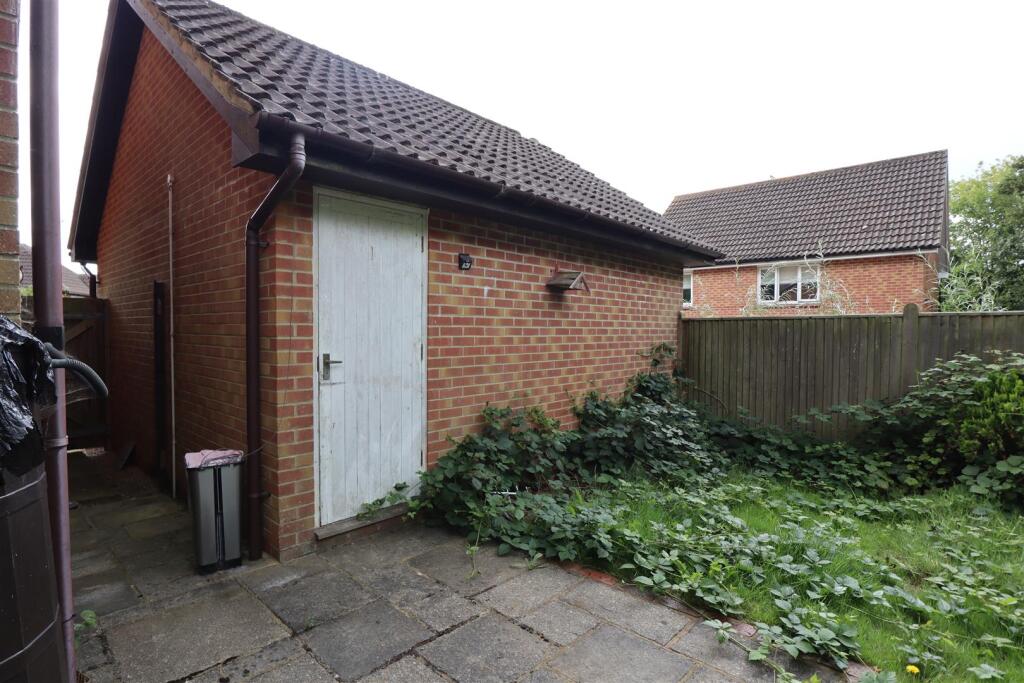Double garage and driveway