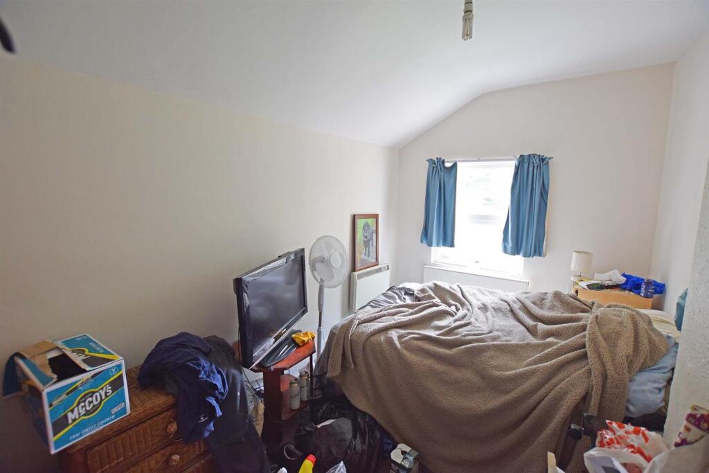 first floor flat bedroom