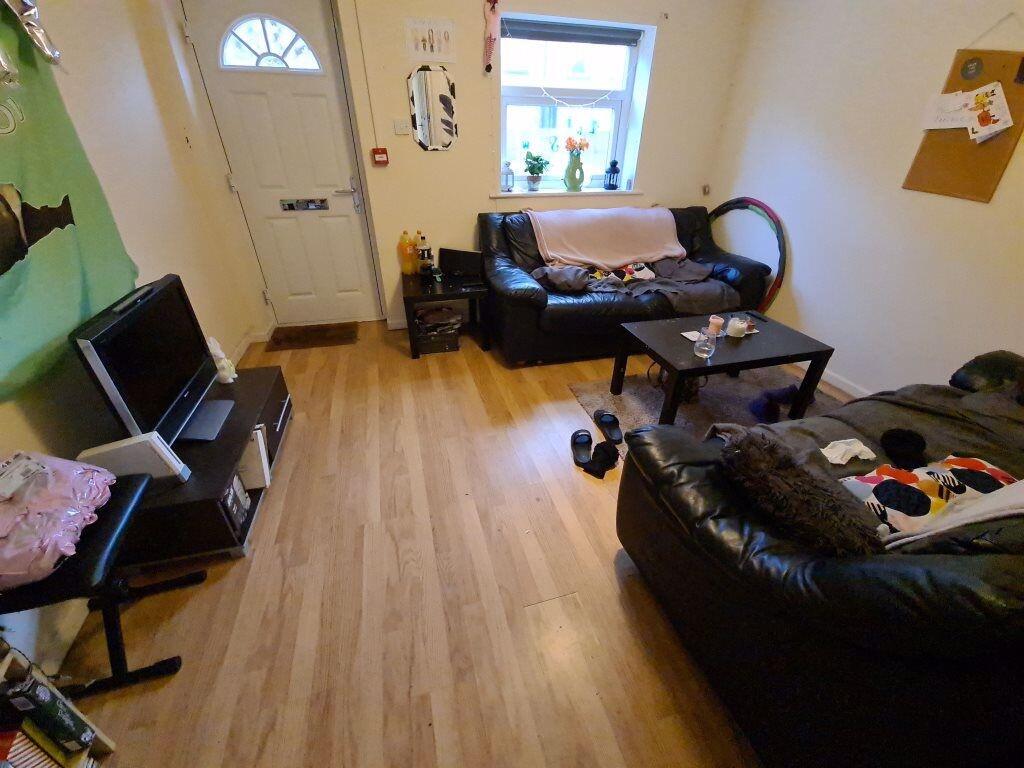 A cozy living room featuring two comfortable bl...