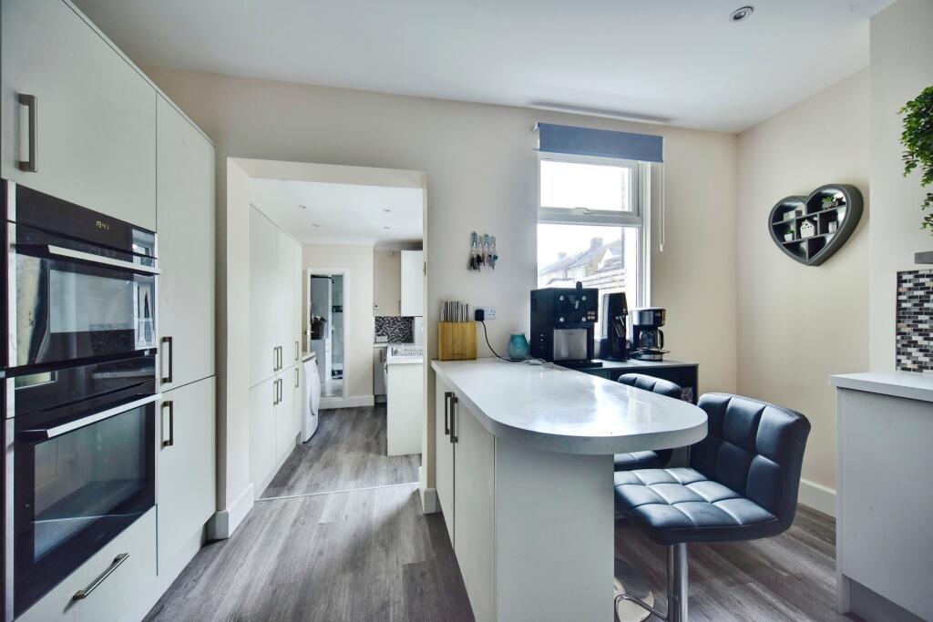 Modern Kitchen With Breakfast Bar View