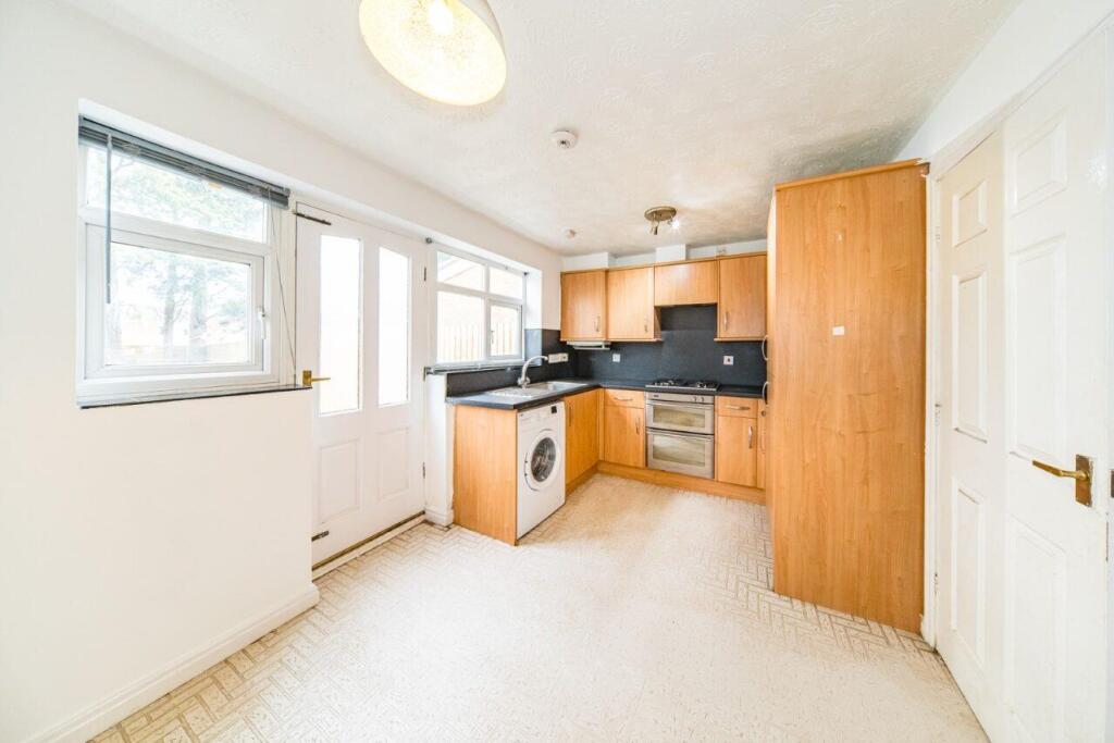 22 Berrywood Drive dining kitchen.jpg