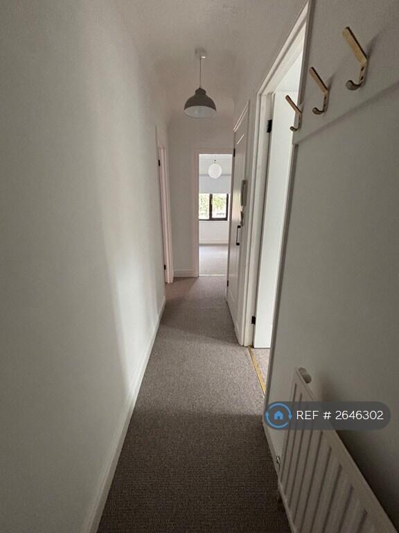 Entrance Hall With Storage Cupboard 