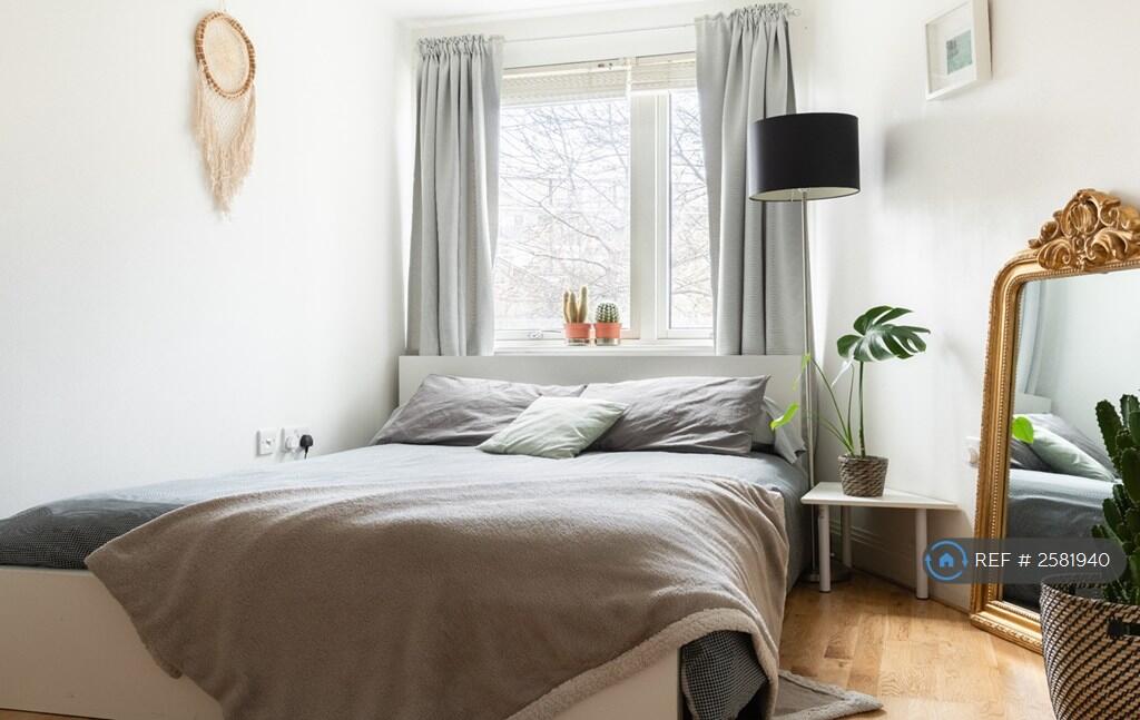 Large Bedroom With a Spacious Built-In Wardrobe