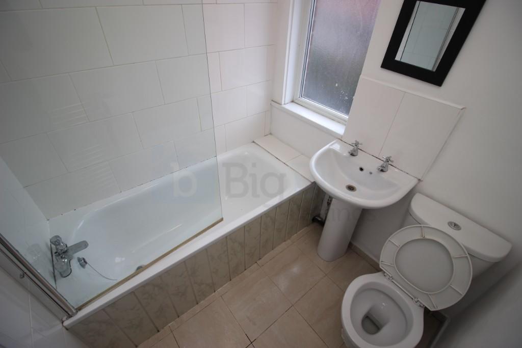 Bright and clean bathroom featuring a full bath...