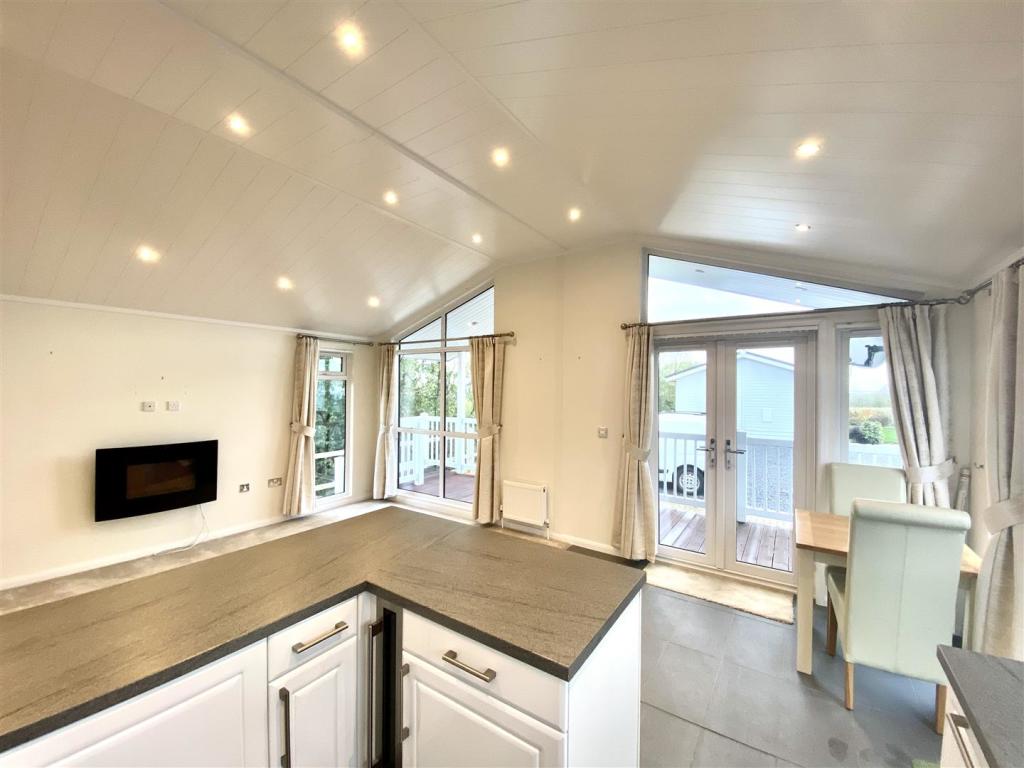 KITCHEN/LIVING/DiNING ROOM
