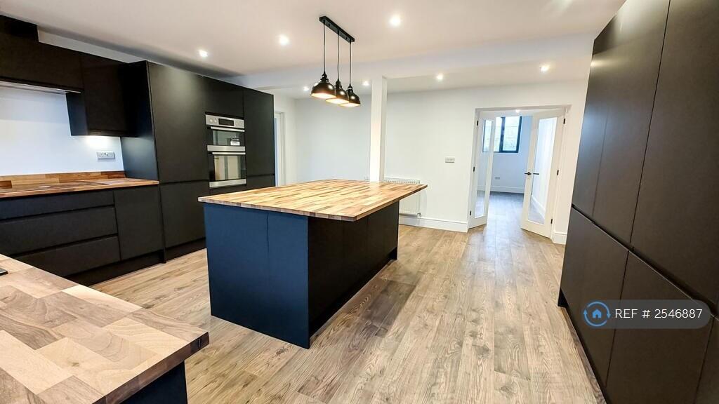 Large Open Plan Kitchen And Breakfast Bar
