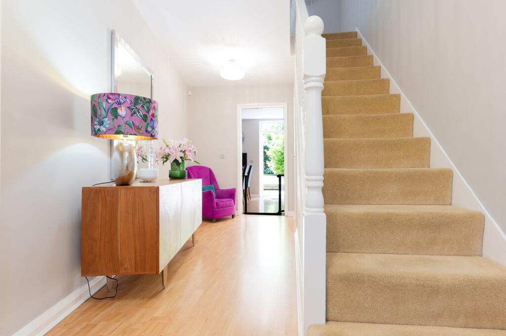 ENTRANCE HALLWAY LANDING AND UTILITY ROOM