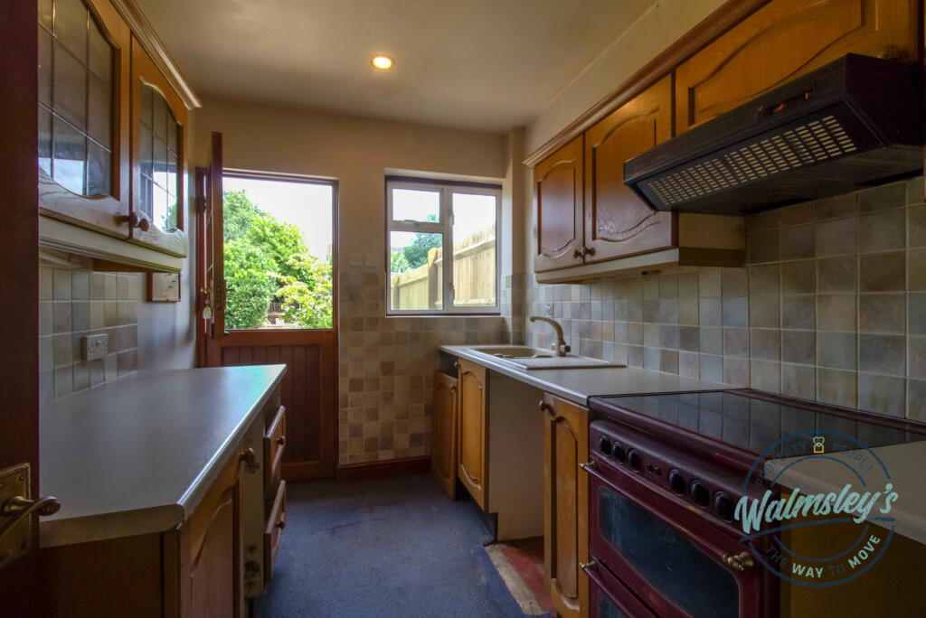 Kitchen with barn door to garden