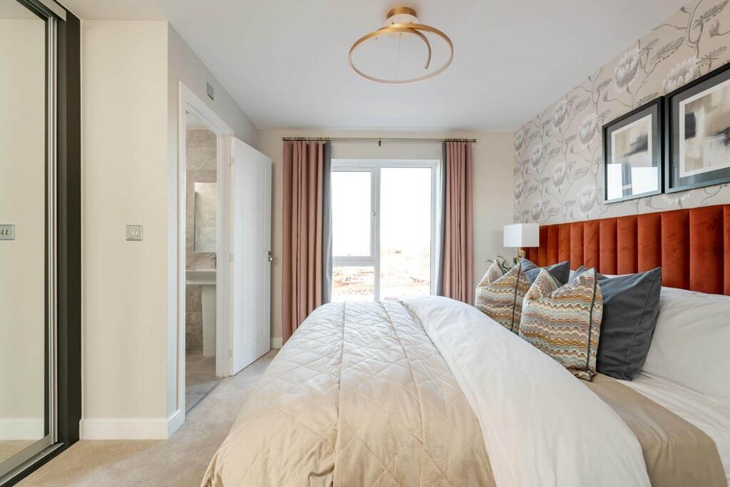 A spacious main bedroom is the perfect place to unwind away from the rest of the home