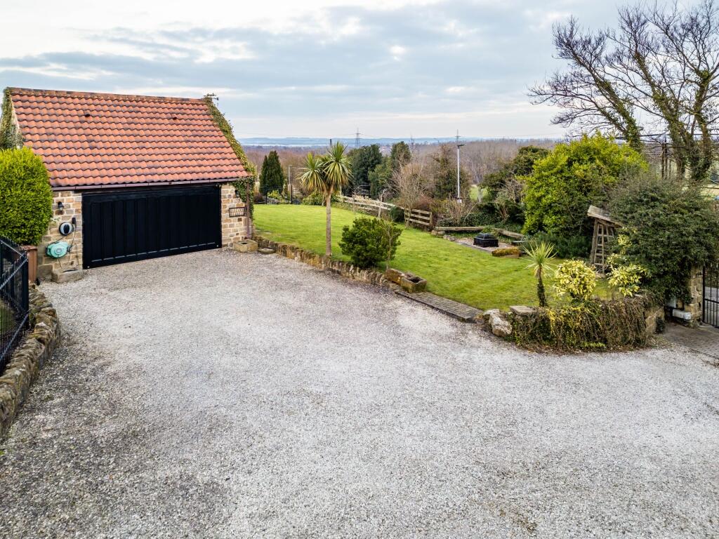 Garage and front garden 