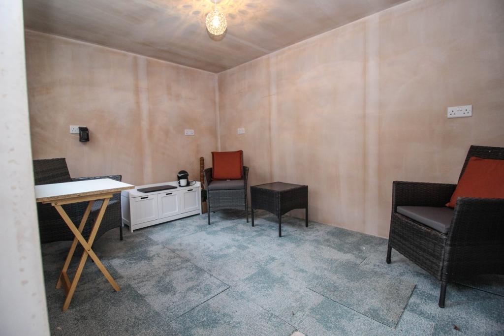 Seating Area/Home Of