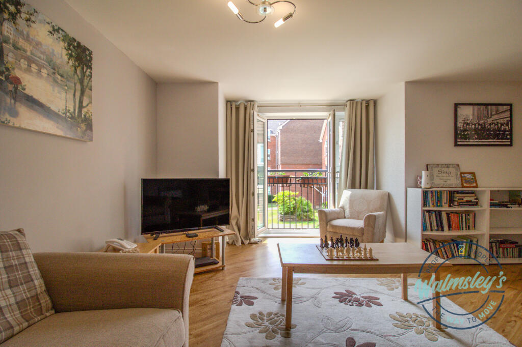 Sitting room &amp; French doors to Juliet Balcony