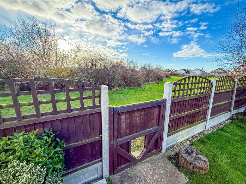 VIEWS OF GREENSWARD TO REAR