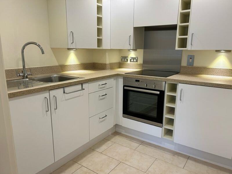 Kitchen with built-in appliances