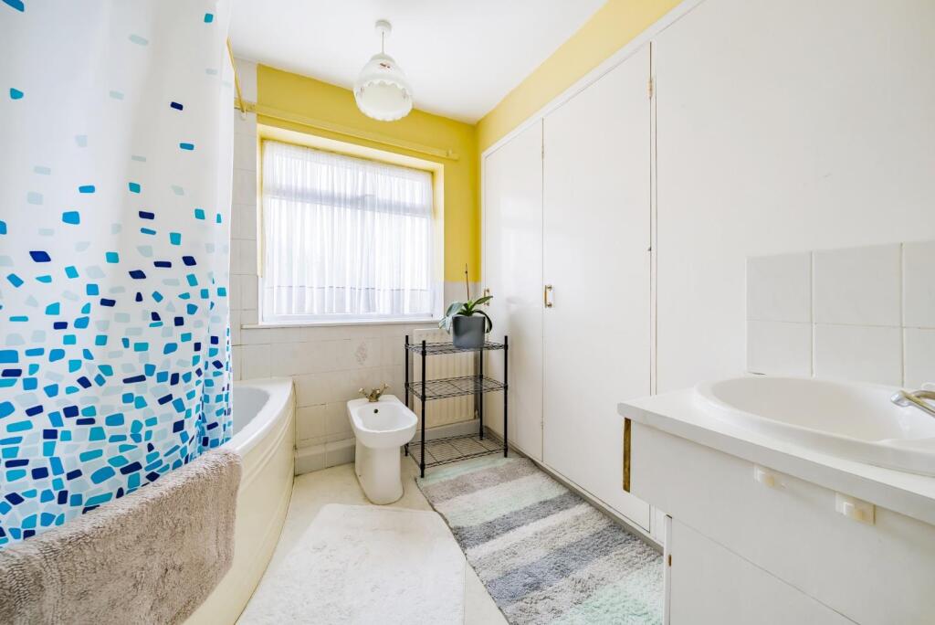 BATHROOM with SHOWER over bath.jpg