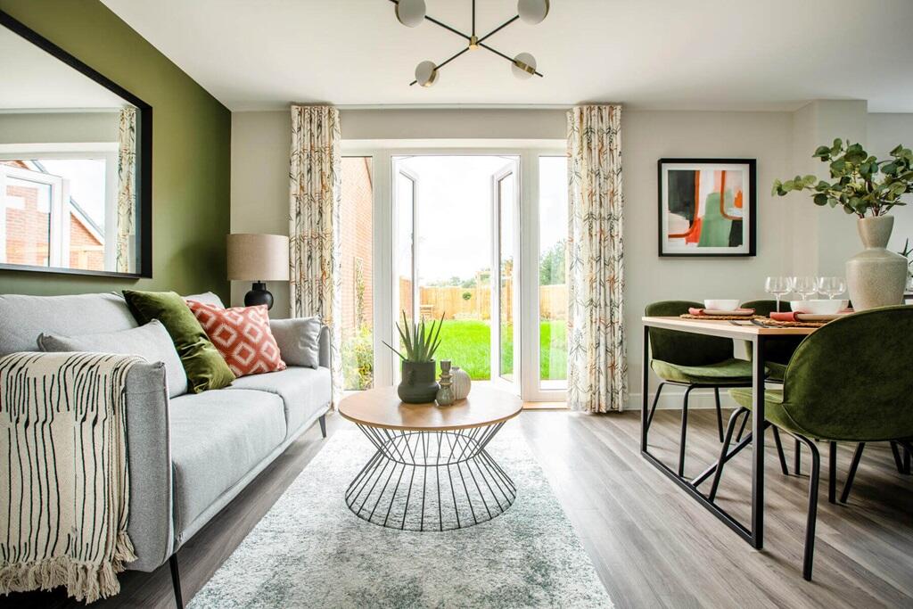 Double doors lead from the dining area to the garden, perfect for alfresco dining