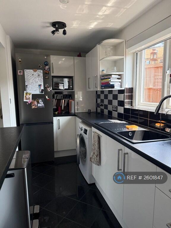 Kitchen With Full Size Fridge