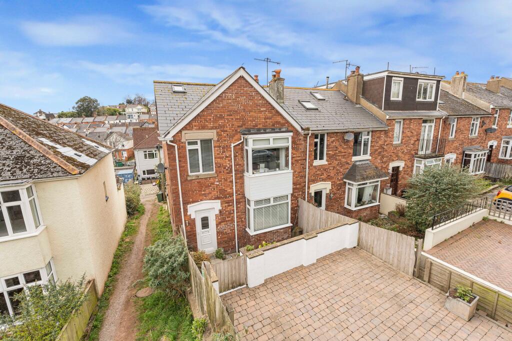 Front of house with 2 parking spaces