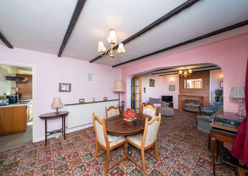 DINING ROOM OPENS TO LOUNGE