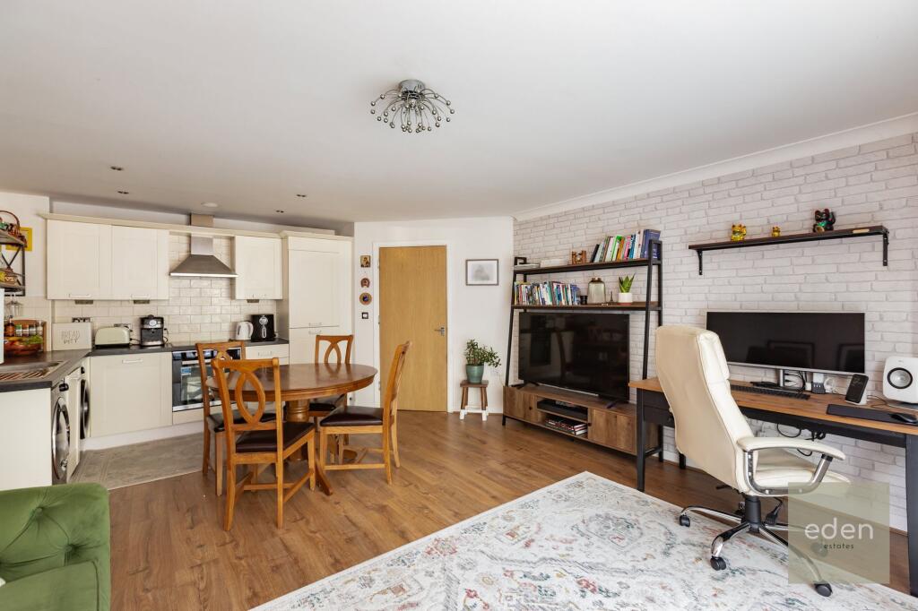 Lounge open plan to Kitchen