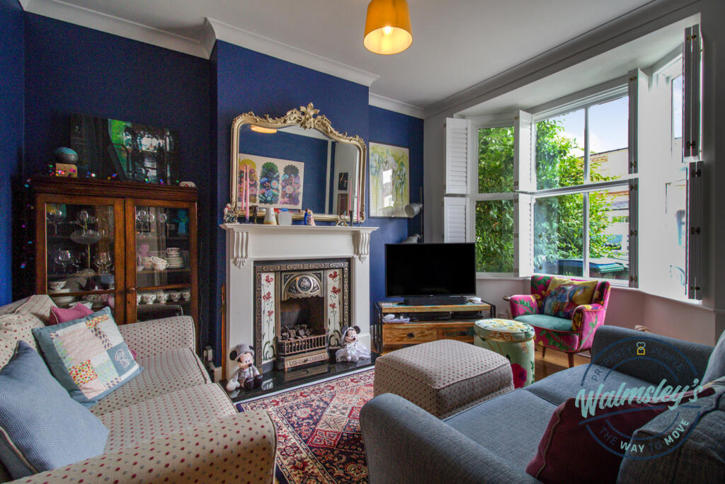 Sitting room with plantation shutters