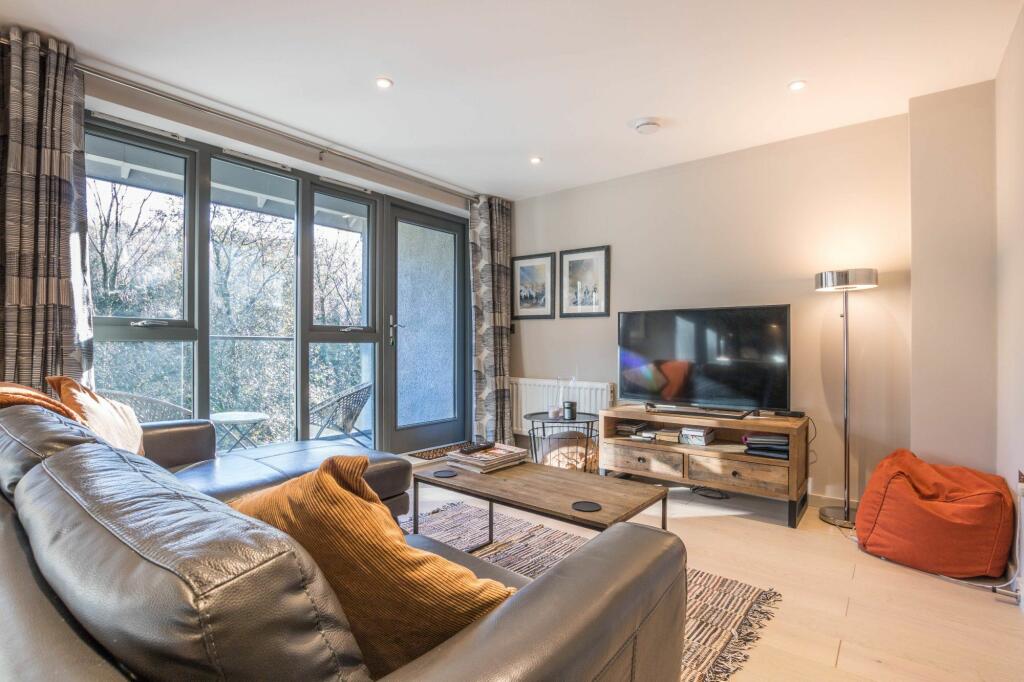 KITCHEN, DINING AND LIVING SPACE