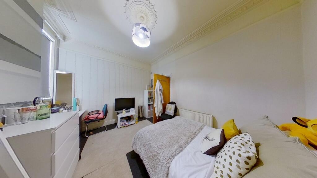 Bright and inviting master bedroom featuring a ...