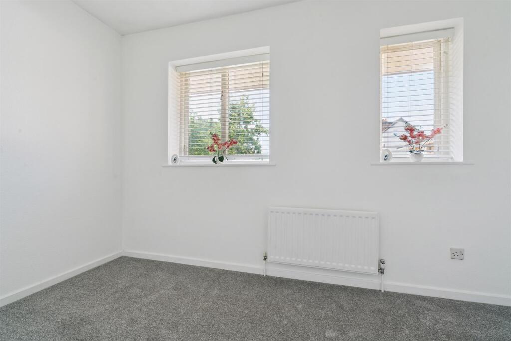 147 Sutton Common Road bedroom 1b.jpg