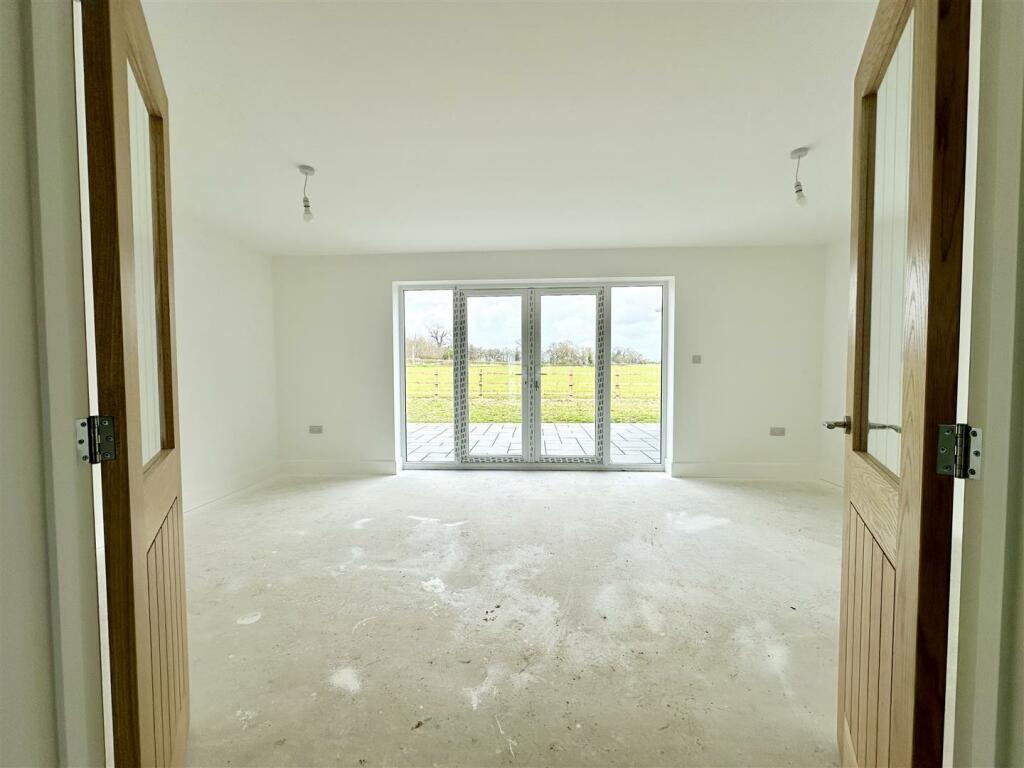 French doors into lounge.JPEG