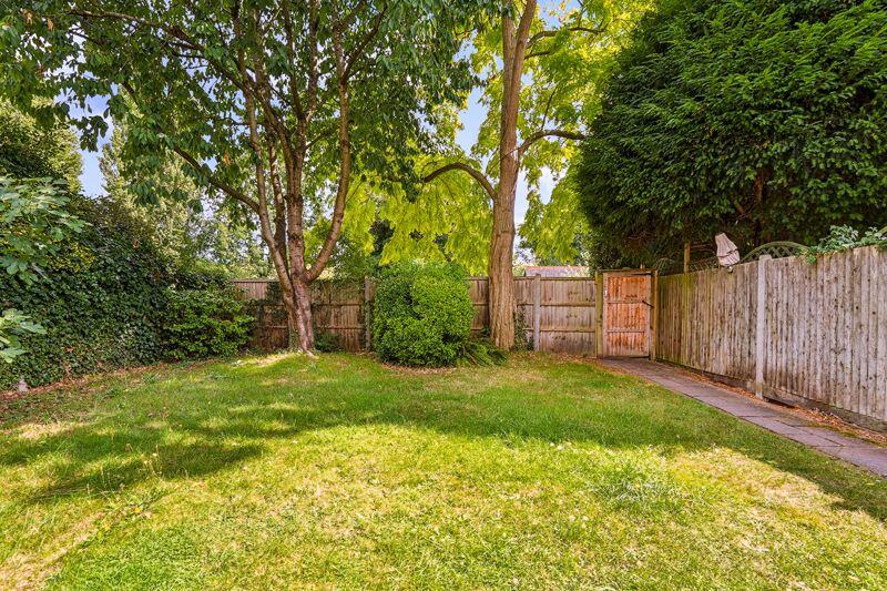 communal garden gate to parking