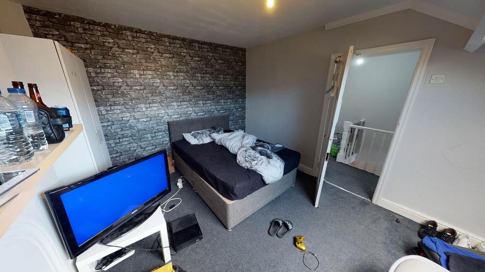 A modern double bedroom featuring a comfortable...