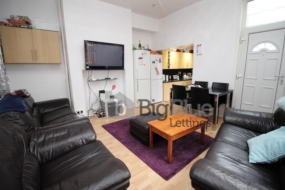 A cozy and inviting living room featuring comfo...