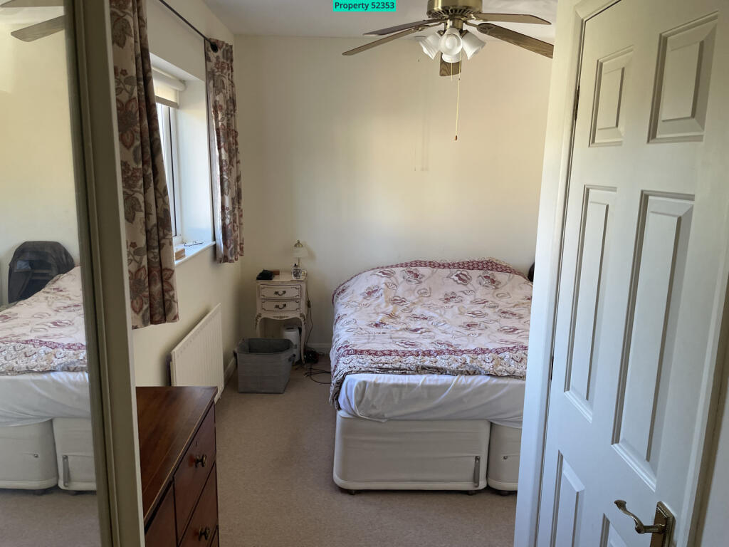 Entrance to main bed... cupboards, large wardrobe,