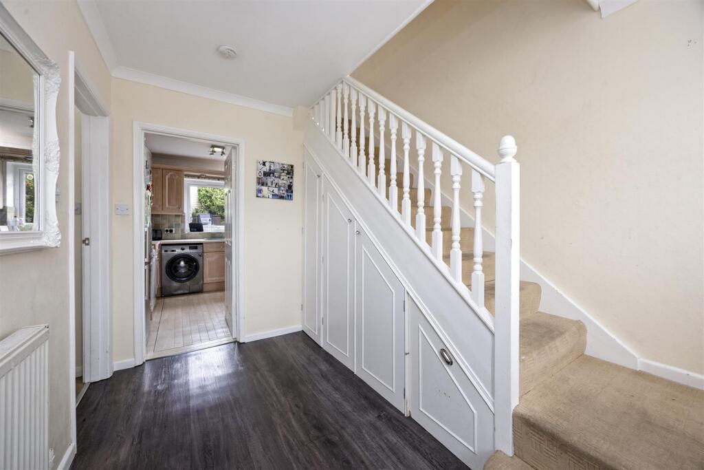 Stairs rising to First Floor