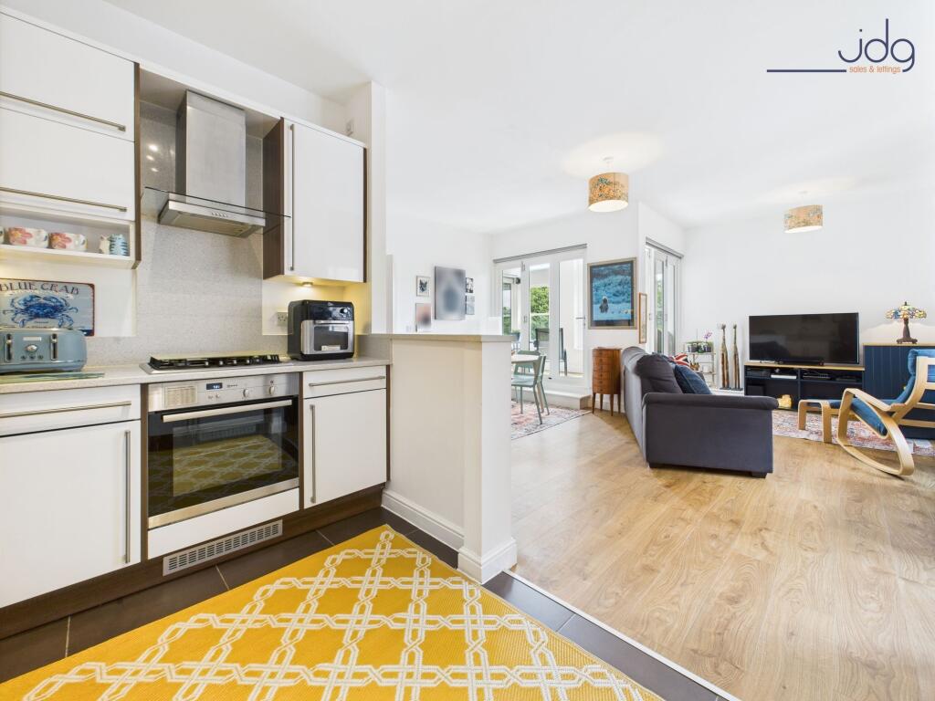 Open Plan Kitchen, Living, Dining with entrance to the balcony