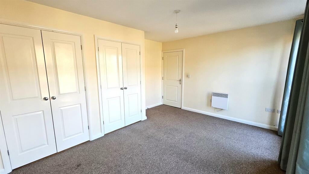 Bedroom one, view 2.jpg