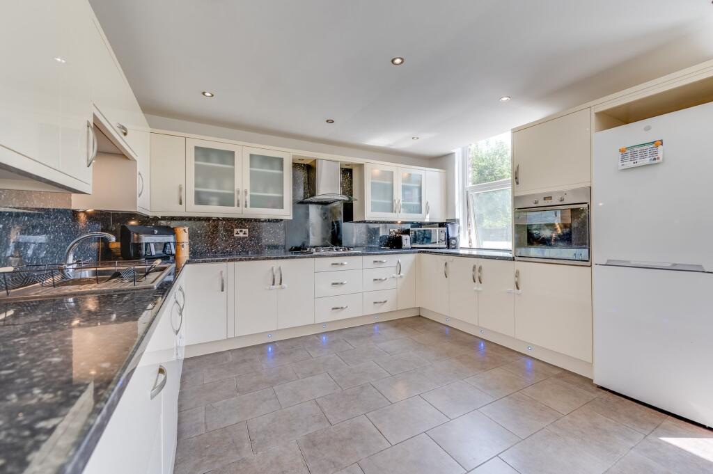 KITCHEN, DINER AND LIVING ROOM