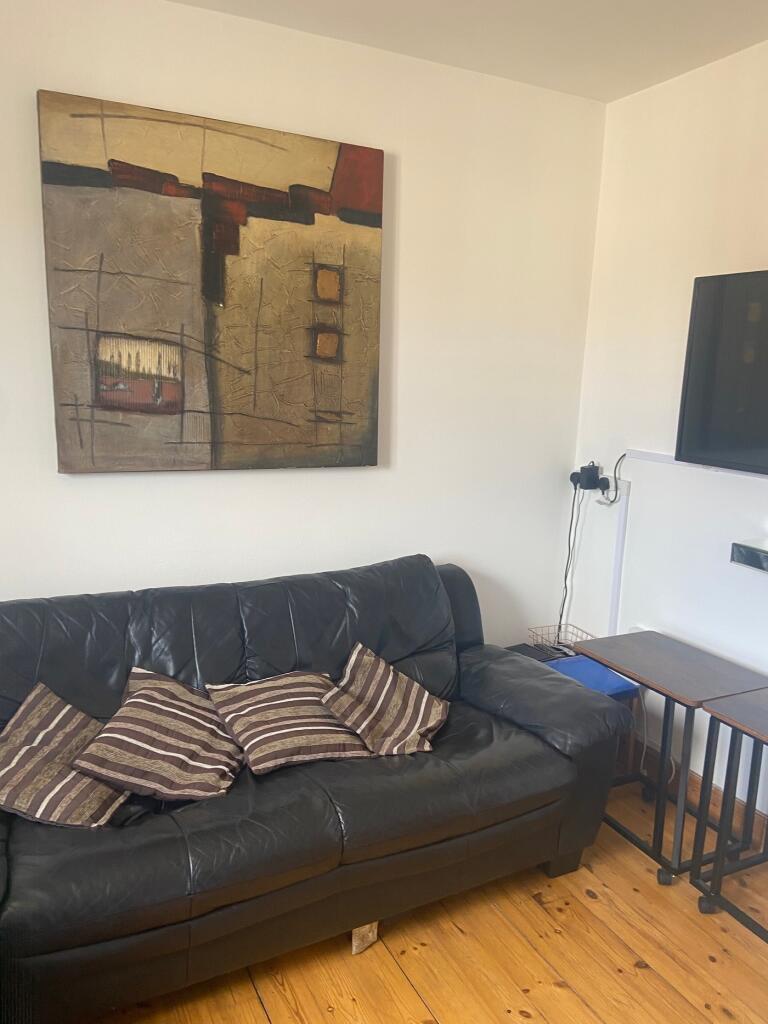 A cozy living room featuring comfortable seatin...